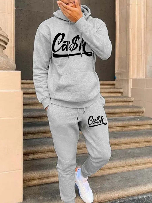 Women's sporty hoodie and jogger pants set with catchy inscription Chic und Stil