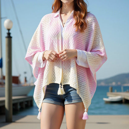 Airy knitted poncho for ladies with decorative fringes Chic and Style
