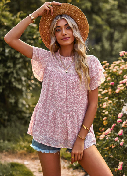 Dynamic feminine blouse with ruffle details and floral design Chic und Stil