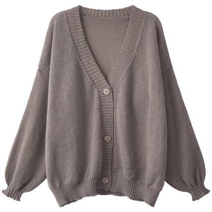 Ladies Cozy Knit Pullover with Voluminous Sleeves and Button Details Chic und Stil