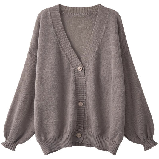 Ladies Cozy Knit Pullover with Voluminous Sleeves and Button Details Chic und Stil