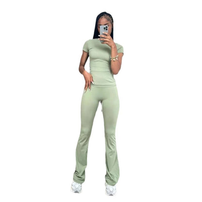 Chic and Style ladies' sporty outfit with fitted top and flared pants