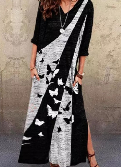 Robe maxi femme avec un design de papillon artistique et des poches pratiques Chic und Stil