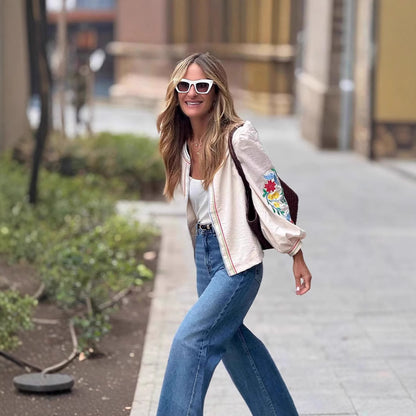 Chemisier tendance pour femmes avec broderies florales et ceinture à la taille Chic und Stil