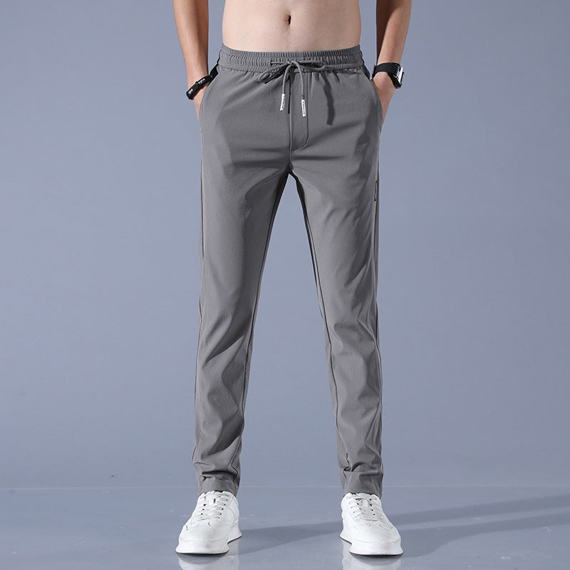 Men's sports pants with adjustable drawstring and zippered pockets on the sides Chic and Style
