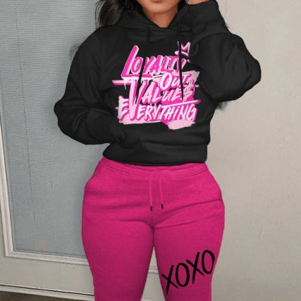 Leisure hoodie and jogger pants set for women with unique lettering and modern accents Chic and Style