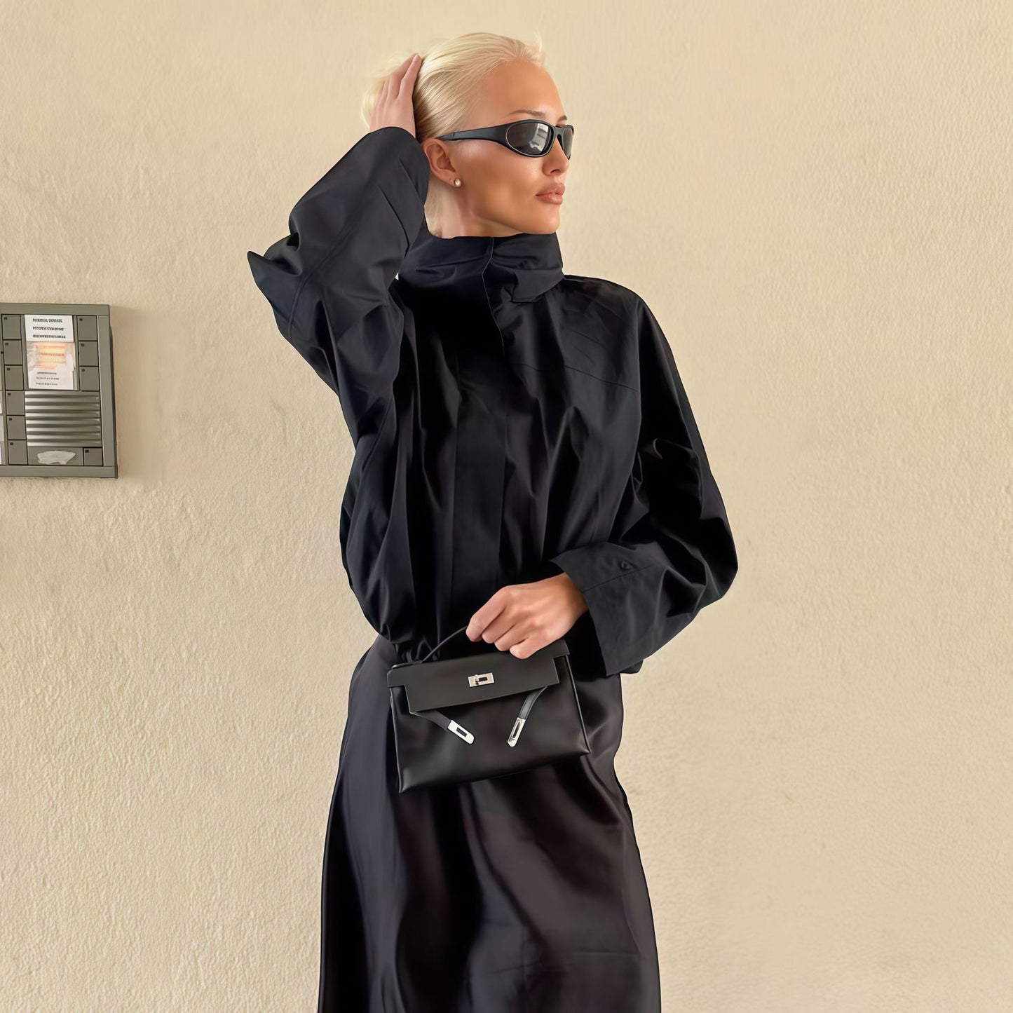 Functional oversized jacket for ladies with high collar and innovative design Chic and Style