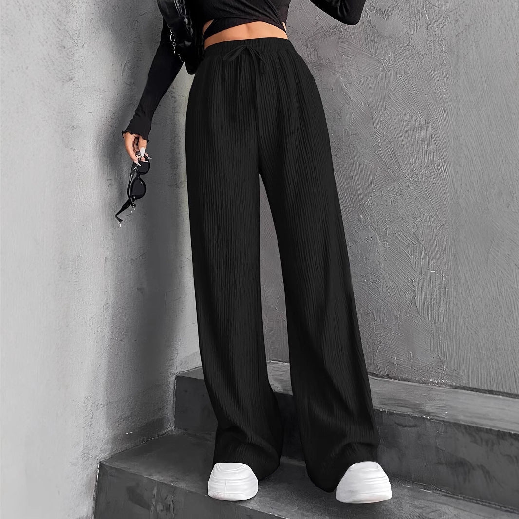 Wide pleated pants for women with elastic waistband and practical pockets Chic and Style