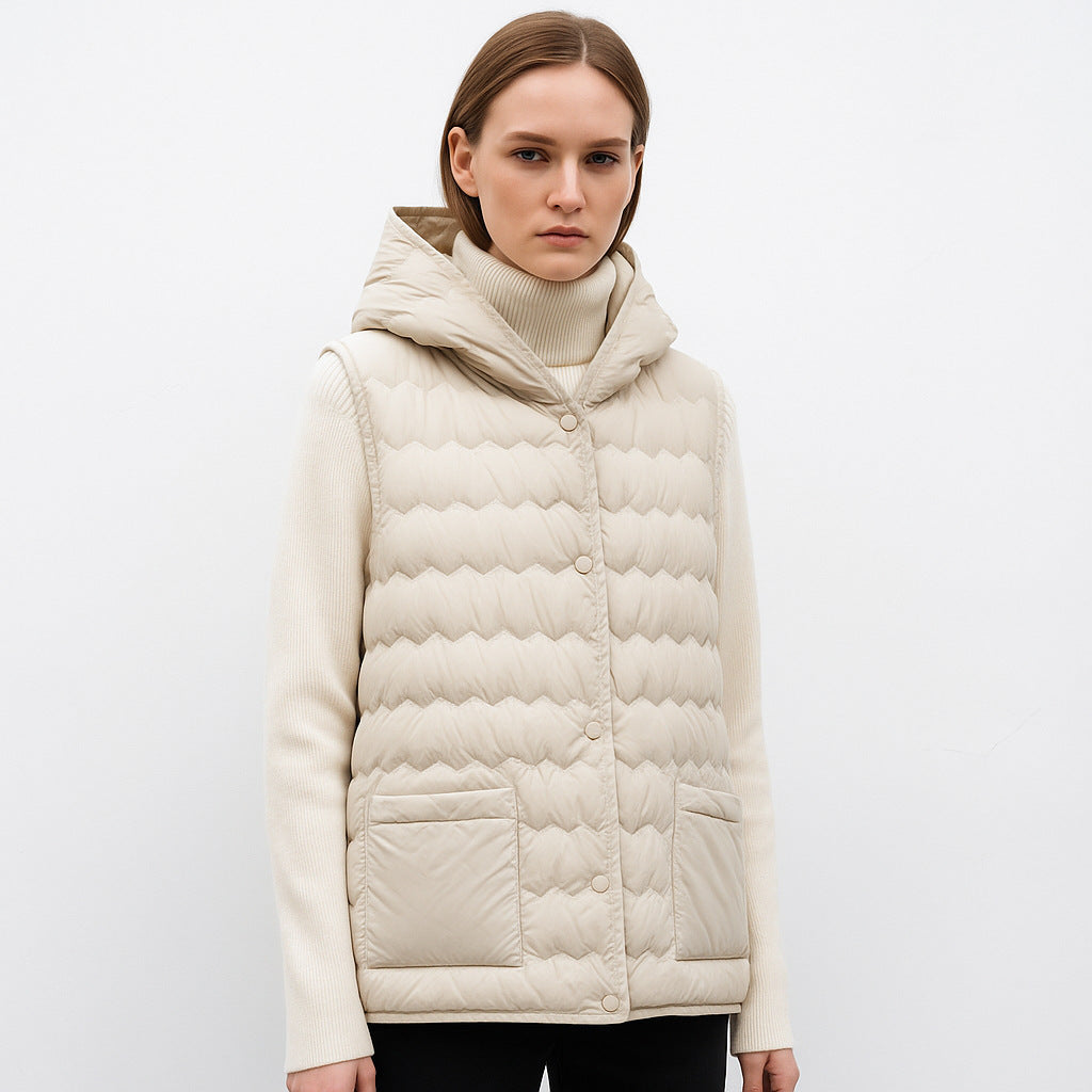 Dames gilet matelassé avec capuche Chic und Stil