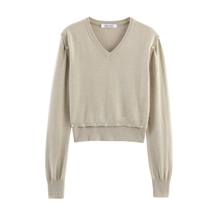 Pull court à la mode pour femmes avec détails de boutons Chic und Stil