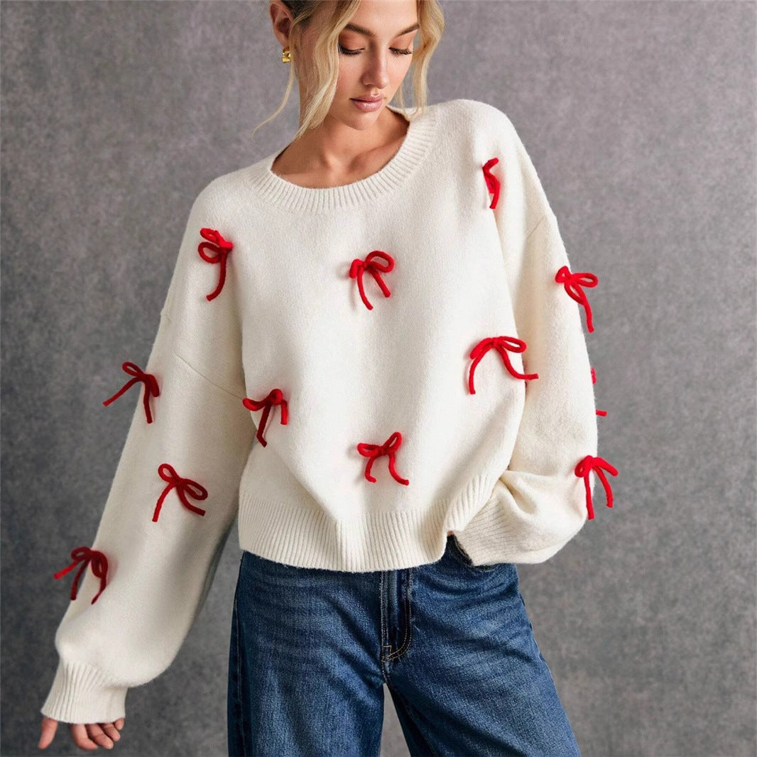 Pull femme avec des éléments de nœud décoratifs et une coupe moderne Chic und Stil