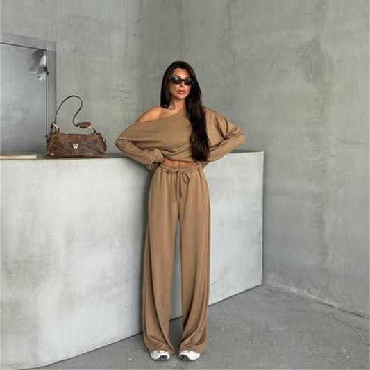 Combinaison décontractée pour femmes avec des jambes larges et un design off-shoulder Chic und Stil