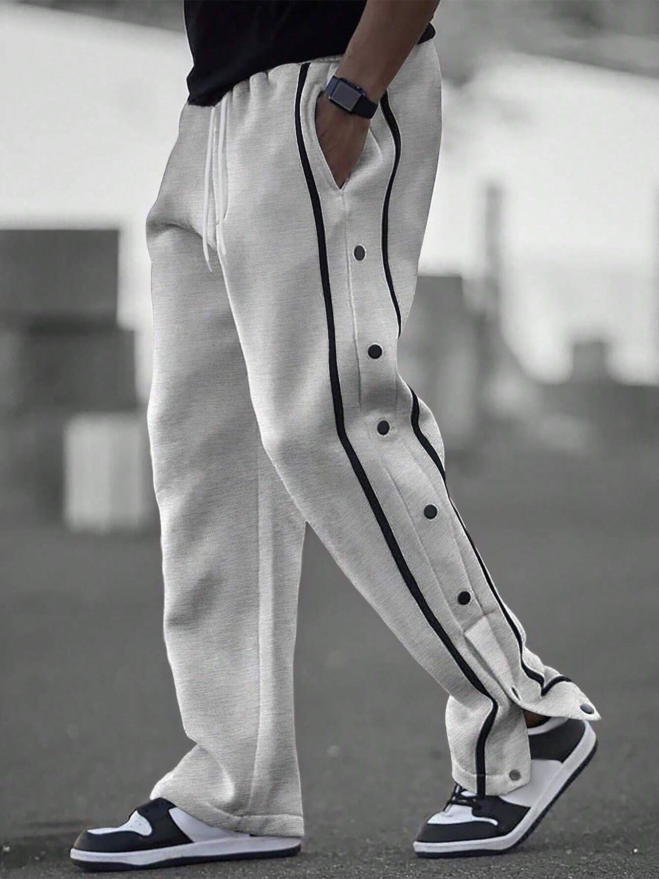 Stylish men's sports pants with snap button details and side pockets Chic and Style