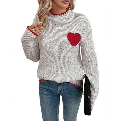 Pull-over en tricot pour femmes avec application en forme de cœur et ourlet décoratif Chic und Stil