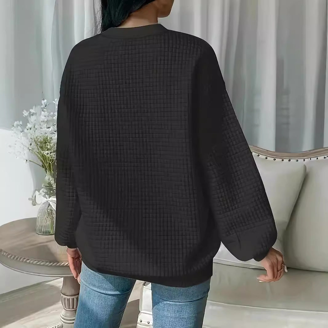 Pull femme avec design en gaufre texturé et coupe décontractée Chic und Stil