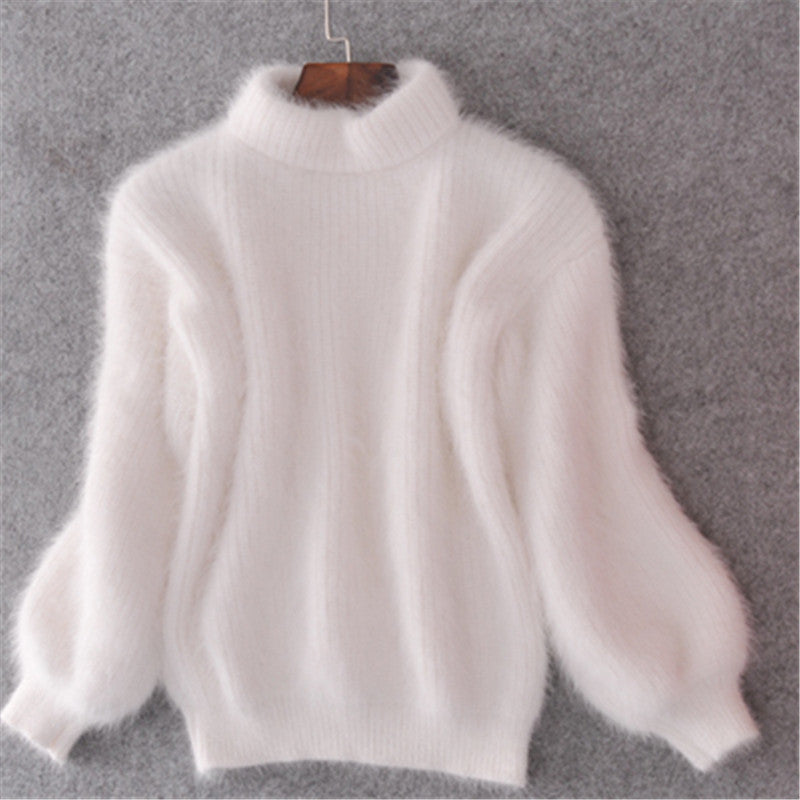 Pull en mohair pour femmes avec col roulé, manches bouffantes et design texturé Chic und Stil