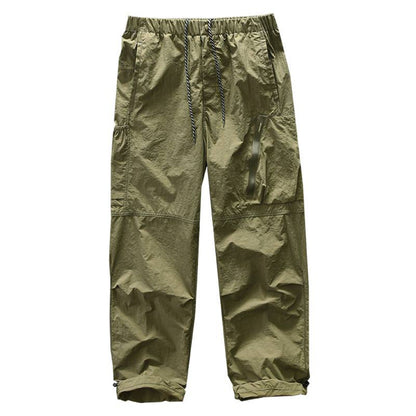 Functional pants for men with elastic waistband and zippered side pockets Chic and Style