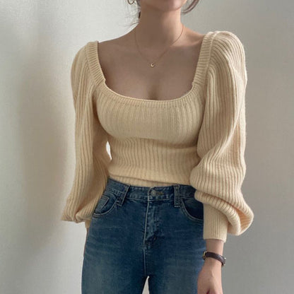 Femme Pull cropped avec des manches volumineuses et une structure côtelée Chic und Stil