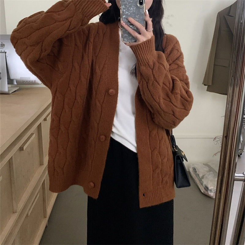 Dames grosse tricot cardigan avec un élégant motif en torsades et des détails de boutons confortables Chic und Stil