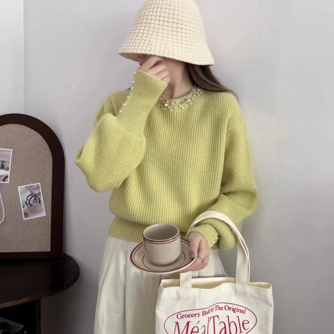 Dames pull élégant avec des détails ornés de perles Chic und Stil