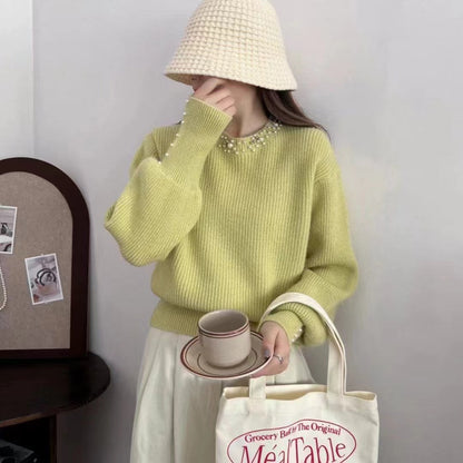 Dames pull élégant avec des détails ornés de perles Chic und Stil