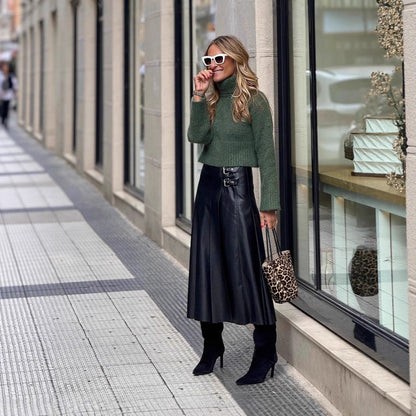 Pull femme à la mode avec col roulé et matériau doux Chic und Stil