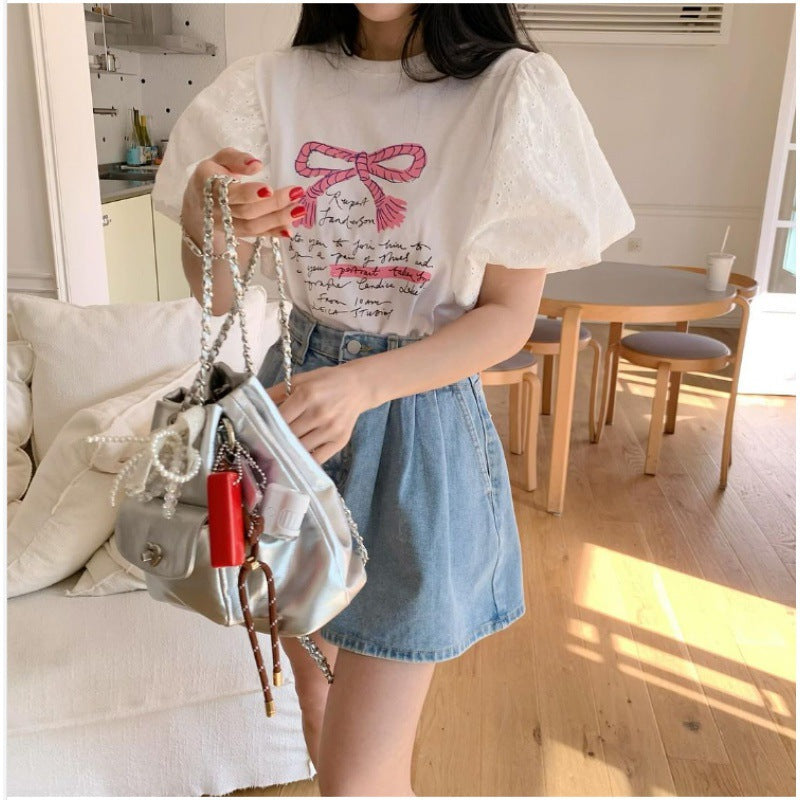 Ensemble T-shirt graphique à manches bouffantes pour femmes et shorts en denim taille haute Chic und Stil