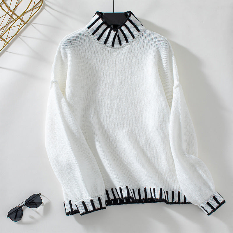 Pull féminin à col montant et poignets contrastants Chic und Stil