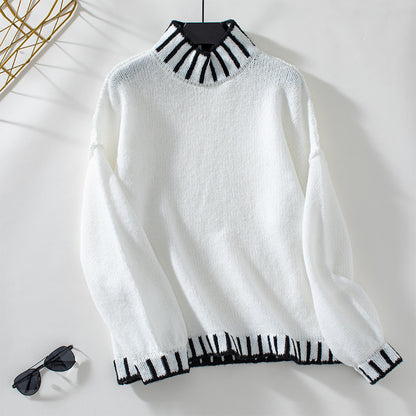 Pull féminin à col montant et poignets contrastants Chic und Stil