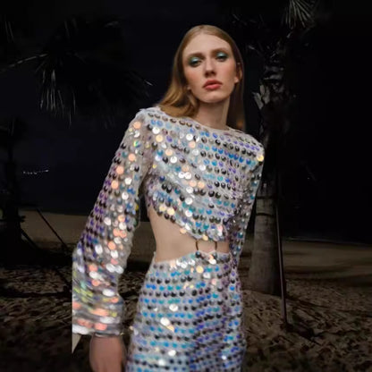 Robe courte élégante pour femmes avec manches transparentes et ornements en sequins Chic und Stil