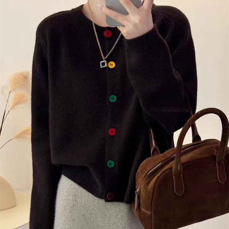 Women's playful knit vest with colorful button details Chic and Stil