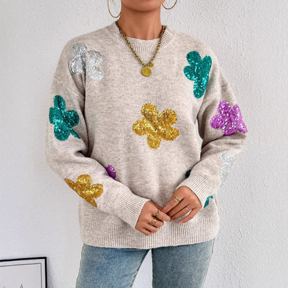 Pull en tricot pour femmes avec des appliqués de fleurs scintillants Chic und Stil