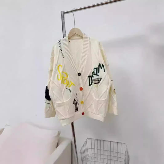 Dames Grand gilet en tricot avec broderies colorées Chic und Stil