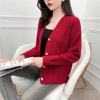 Knitted jacket for women with an elegant braid pattern and high-quality button details Chic and Style