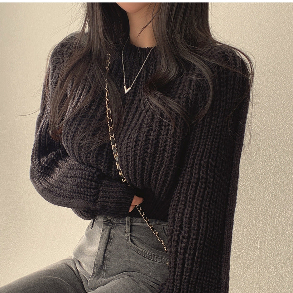 Pull femme en tricot épais avec des manches volumineuses et une texture structurée Chic und Stil