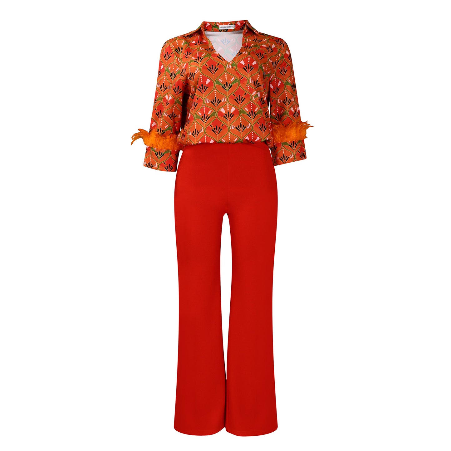 Expressive outfit for women with printed blouse and wide pants Chic and Style