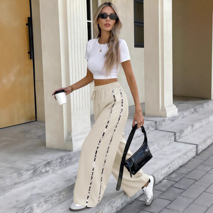 Wide sports pants for women with decorative side stripes Chic and Style
