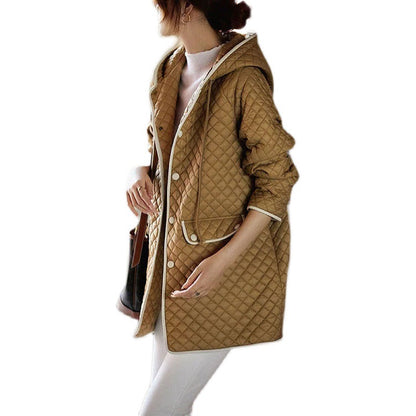 Veste matelassée à capuche avec poches Chic und Stil pour femmes