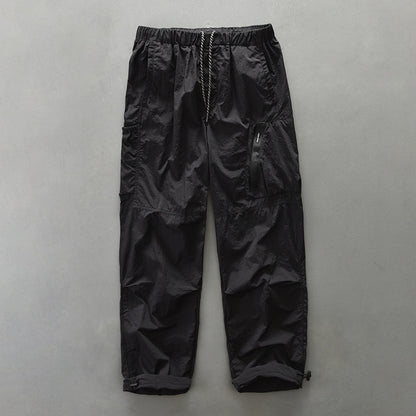 Functional pants for men with elastic waistband and zippered side pockets Chic and Style