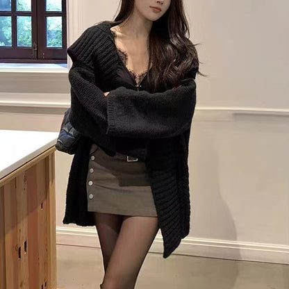 Dame cardigan oversize avec des manches volumineuses et une surface texturée Chic und Stil