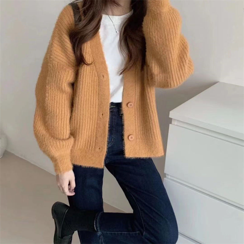 Dames cardigan douillet avec des détails de boutons modernes et une coupe oversized Chic und Stil