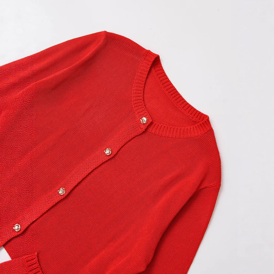 Women's knitted jacket with elegant button details and practical pockets Chic and Style