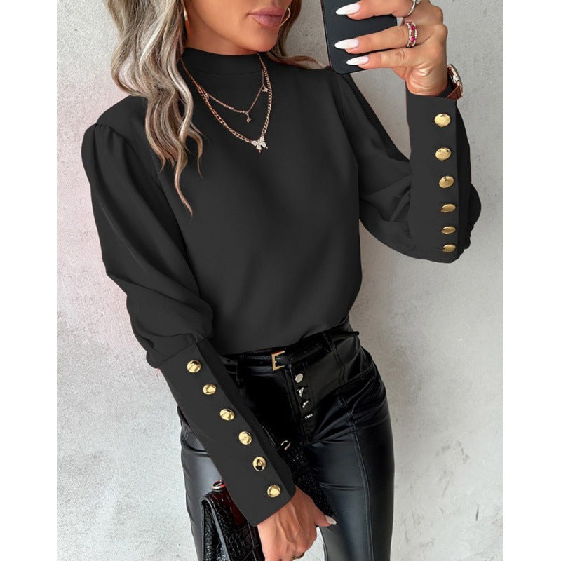 Blouse élégante pour femmes avec des manches bouffantes et des détails de boutons dorés Chic und Stil