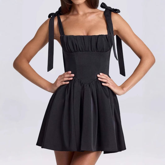 Robe d'été aérienne pour femmes avec une jolie découpe au dos et de charmants nœuds Chic und Stil