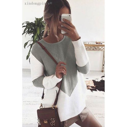 Pull-over en maille grande pour femmes avec un design géométrique moderne et une structure respirante Chic und Stil.