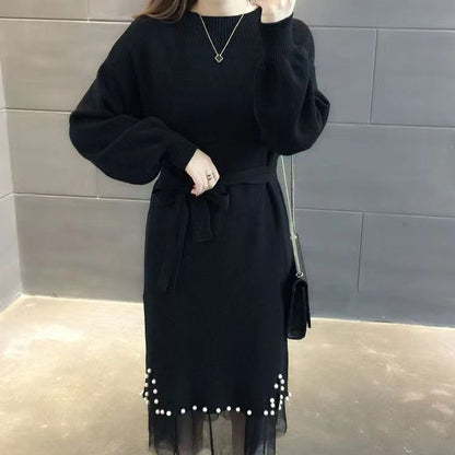 Robe tricotée élégante pour femmes avec ceinture à la taille et ourlet décoratif Chic und Stil