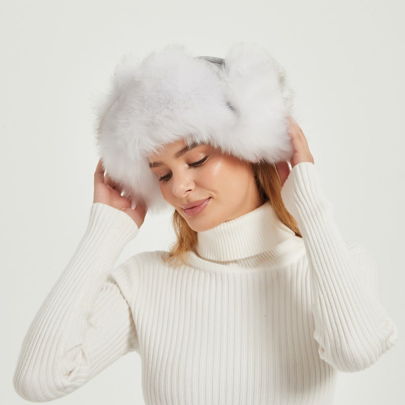 Dames Bonnet d'hiver en fourrure avec oreilles d'animaux et design volumineux Chic und Stil