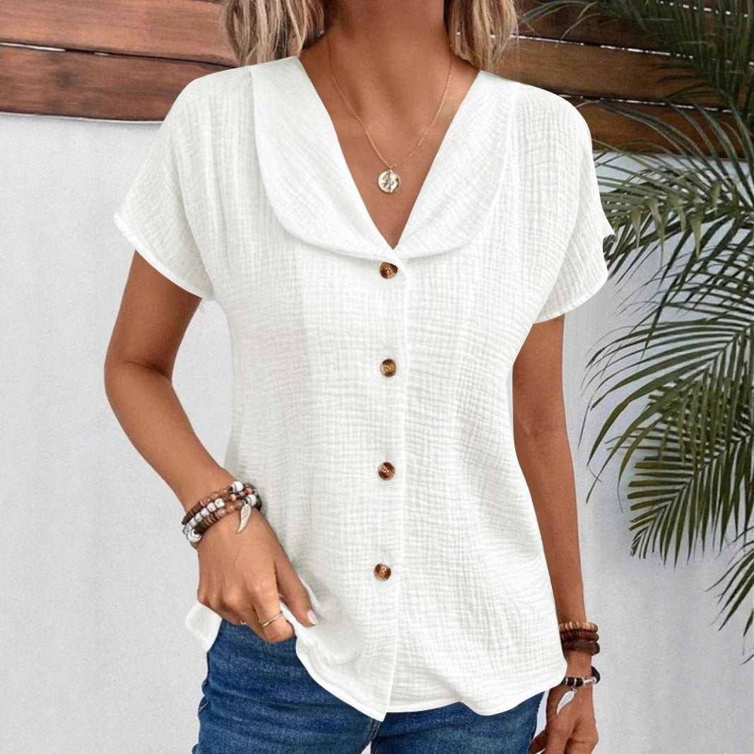 Chemisier féminin avec un col châle élégant et des détails de bouton décoratifs Chic und Stil