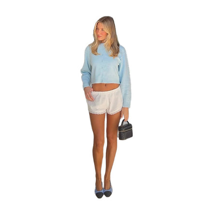 Chic and Style women's casual short knit pullover with button detail