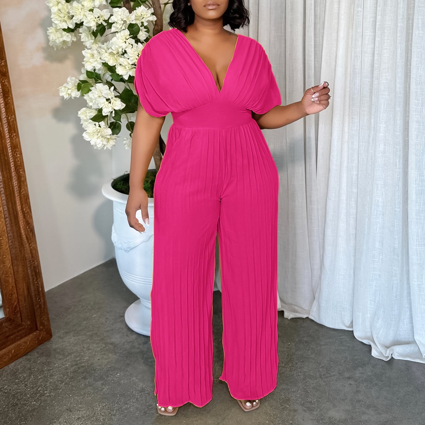 Combinaison plissée pour femmes avec des manches volumineuses Chic und Stil